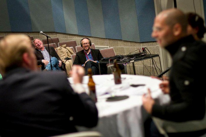 Andy Bowers (center) at a live taping of the Political Gabfest at Grinnell College in 2011. Foreground, left to right: John Dickerson, David Plotz, Emily Bazelon